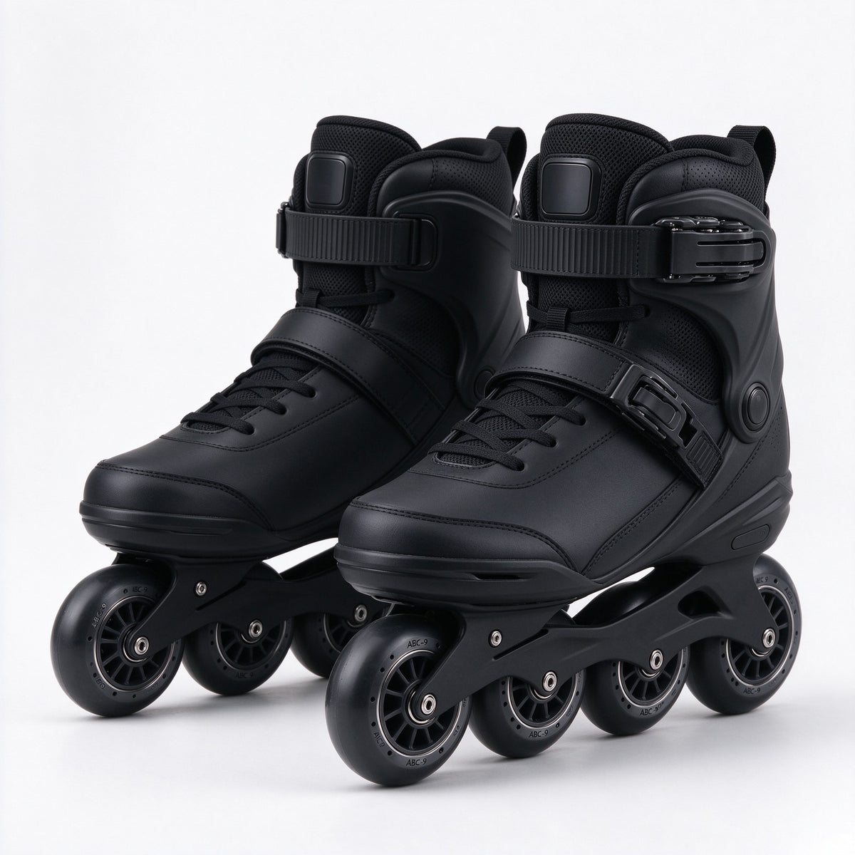 Matte black skates standing on a dark studio floor